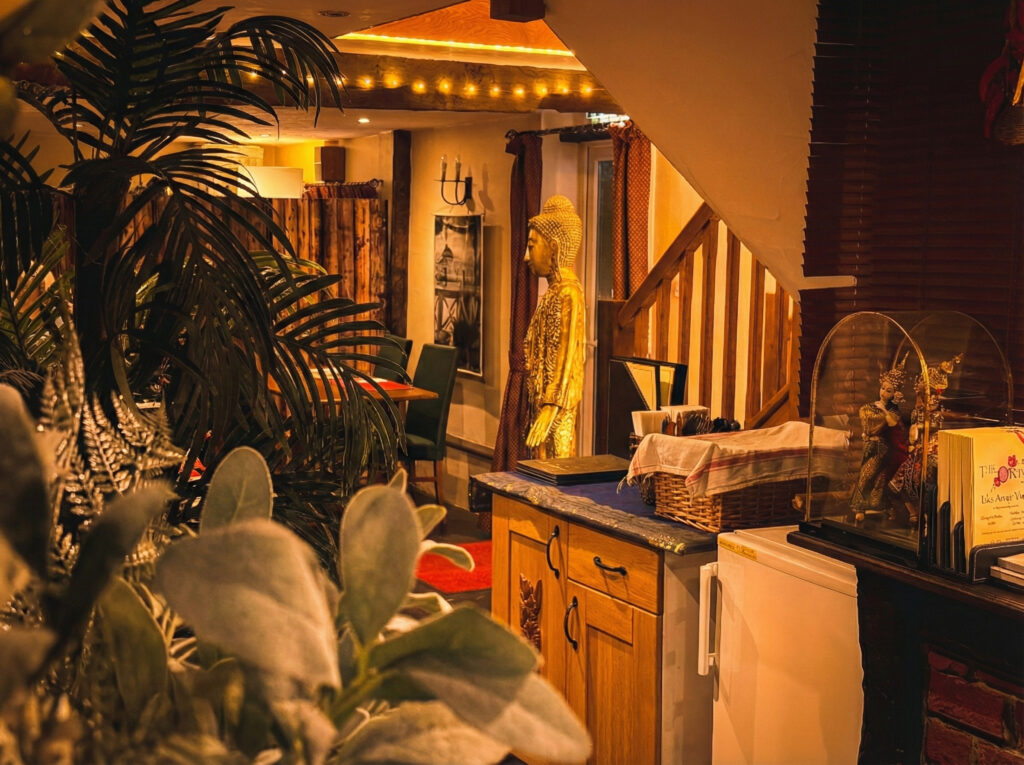 Bar area with Thai decor at Thai Orchid Battle